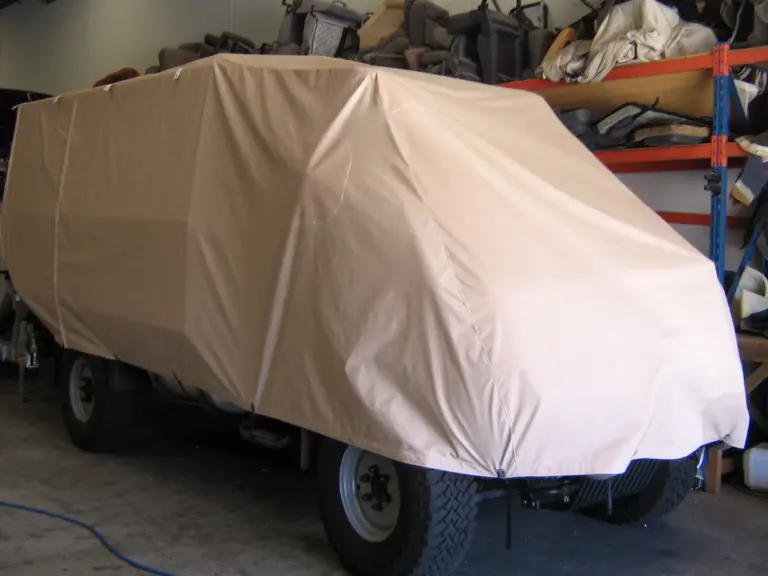 Car under a fitted custom cover